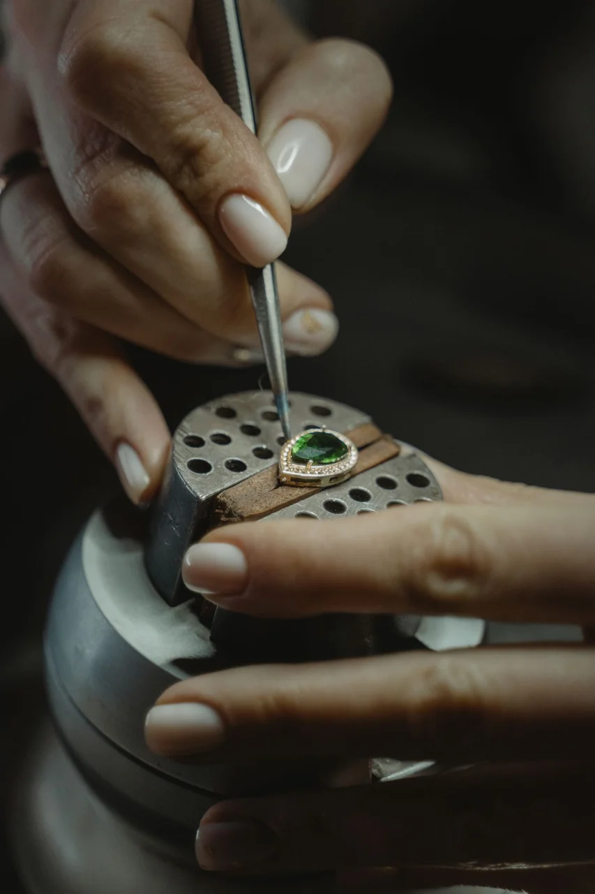 Jeweller setting a stone